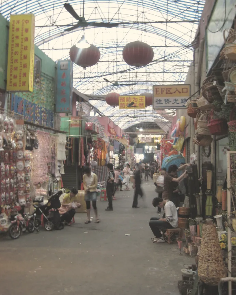 Covered market street with stalls at Haizhu wholesale market, Guangzhou