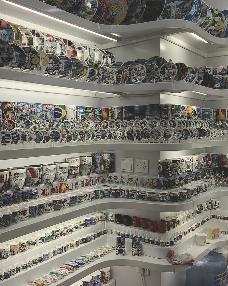 Shelves of ceramic plates and mugs at Yiwu International Trade City